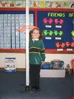 girl-measuring-height